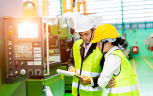 Businessman Or Engineers Are Training New Employees In Industrial Plants